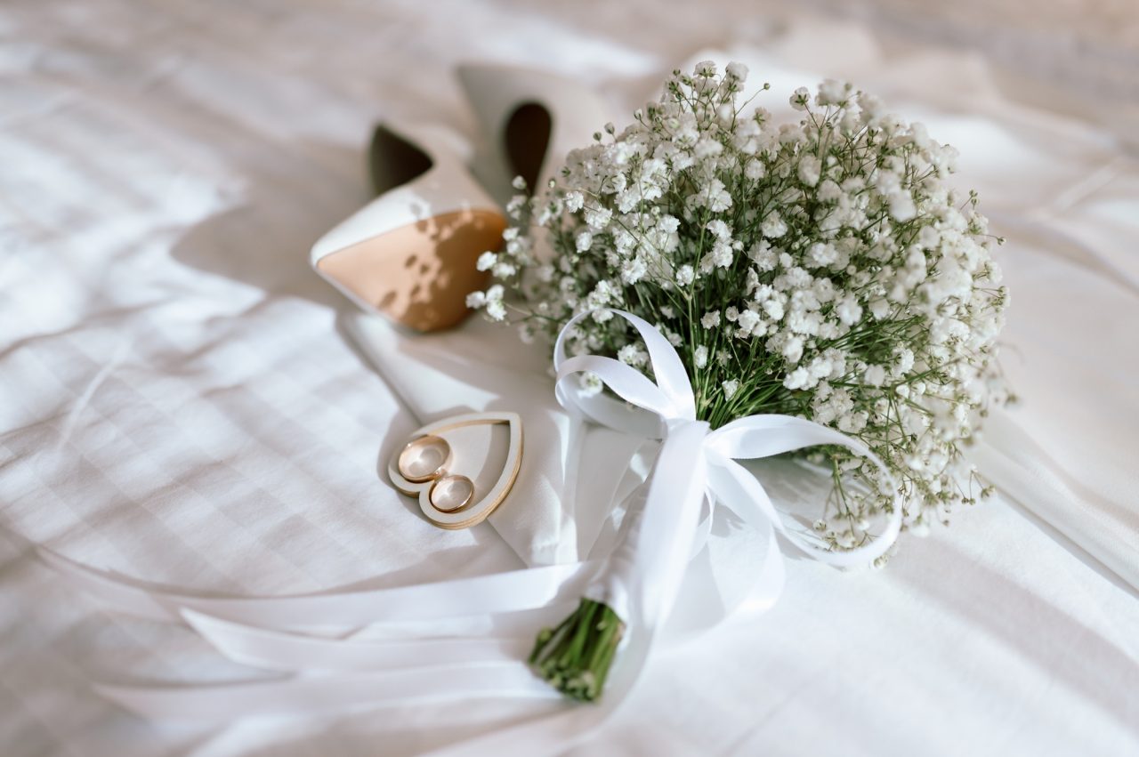 wedding-flowers-with-shoes-and-wedding-rings.jpg